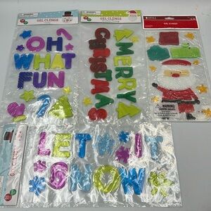 4 NEW packages of Gel Window Clings Christmas Santa reindeer snowflakes winter